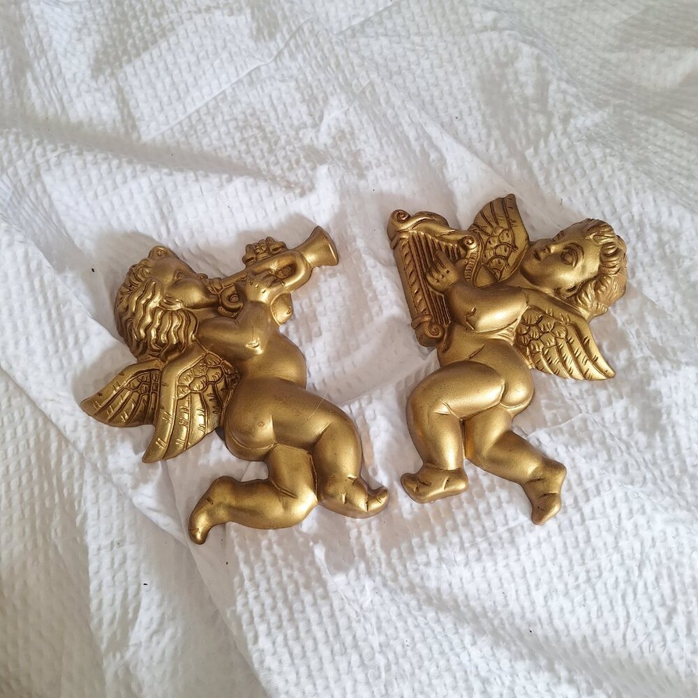 pair of cherub hangings